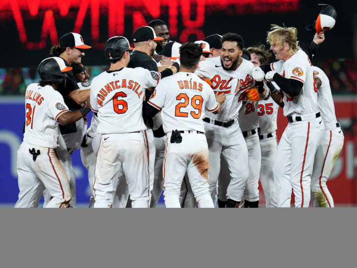 Aug 25, 2022; Baltimore, Maryland, USA; The Baltimore Orioles celebrate designated hitter Anthony Santander’s (25) walk-off hit against the Chicago White Sox at Oriole Park at Camden Yards.